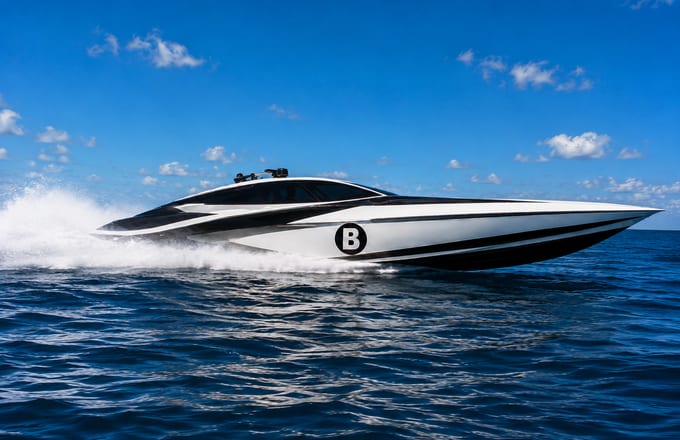 Racing speedboat at planing speed, Bowire emblem on the bow